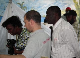 MINISTER OFFICIALLY WELCOMES THE FROGS HOME The Minister of Agriculture is introduced to the mountain chickens