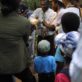 Minister of Agriculture handling a mountain chicken