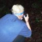 Heléna photographing a released mountain chicken ©Sarah-Louise Adams