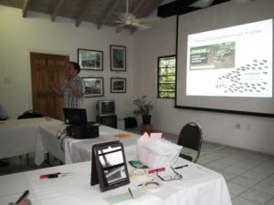 Dr. Rich Young presenting preliminary results from mountain chicken research Lloyd Martins presentation of survey results ©Stephen Mendes
